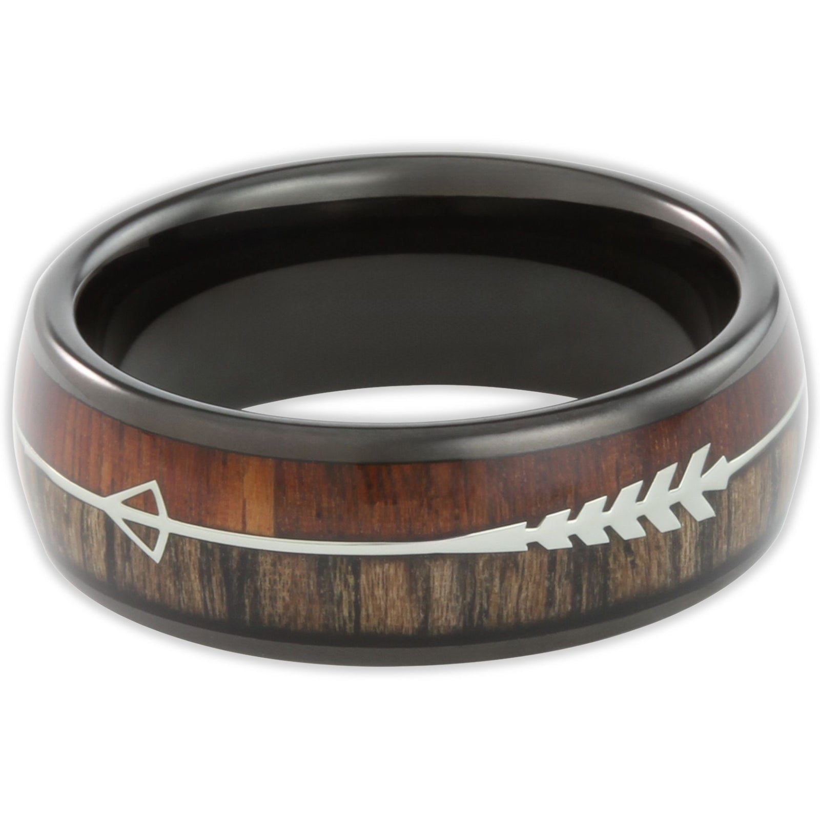 Top view of black tungsten 8mm ring with arrow design and two-tone wood background