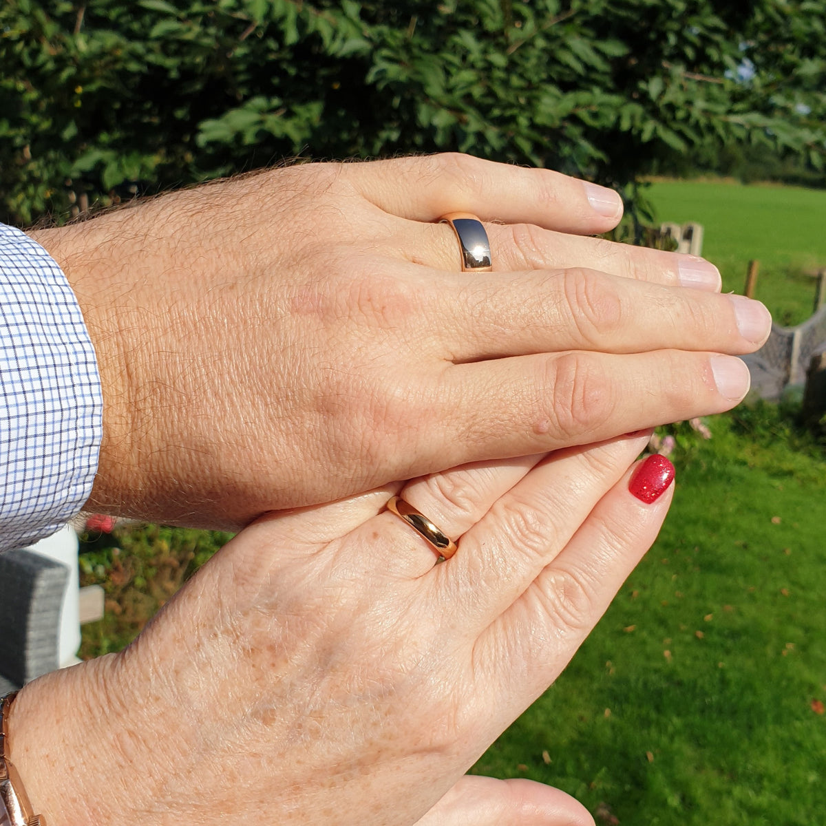 Set of Rose Gold shiny tungsten rings on fingers