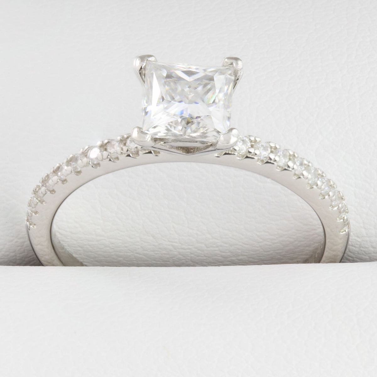 Close-up view of White Gold 1ct Square Moissanite Slimline ring showing classic stone setting
