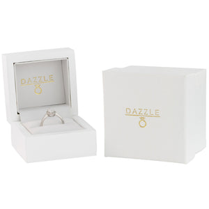 White gold moissanite marquise ring presented in gift box