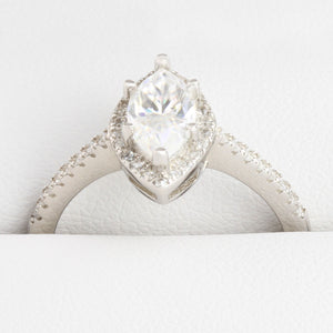 Close-up of marquise moissanite centre stone with pavé-set shoulder stones in white gold ring