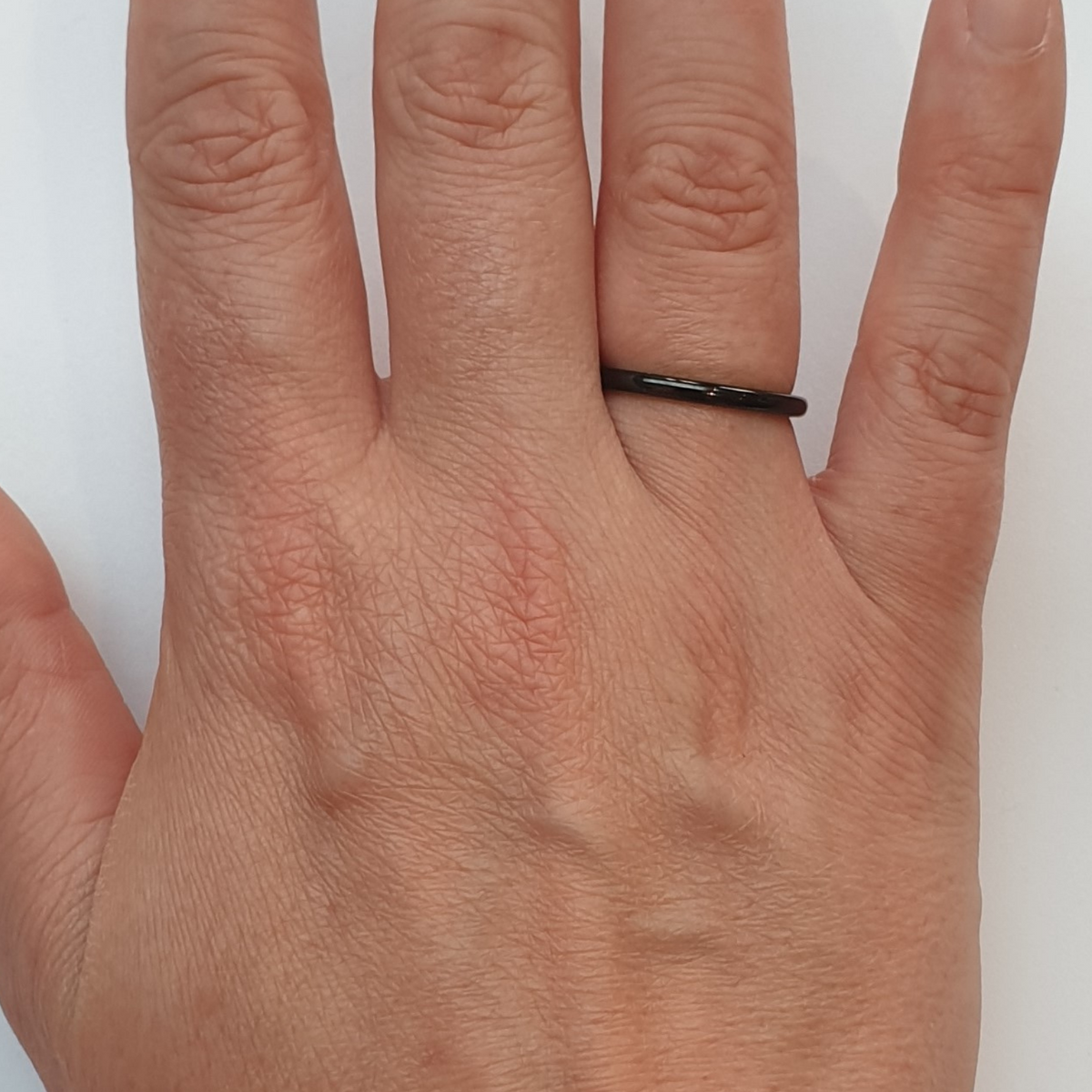 Black 2mm Wonder Ring on Finger