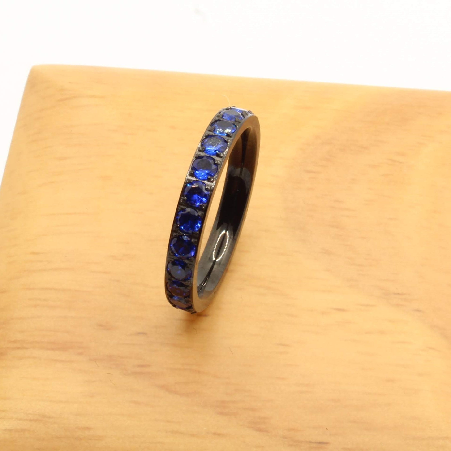 Sparkling Ladies Titanium 3mm Blue Zirconia On Black Glitz Ring - Rock ...
